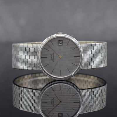 PIAGET Armbanduhr in WG 750/000, Schweiz um 1980, Automatik, Ref. 13601 C4, massives Geh.,Boden aufgedr., silb. Zifferbl. fl., gold. Zeiger, Datum, ...