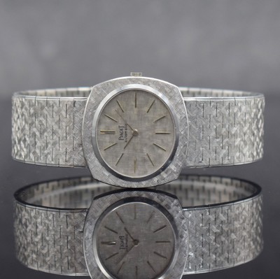 PIAGET Armbanduhr in WG 750/000 Ref. 12441 A3, Schweiz um 1970, Automatik, massives Geh., Boden 4-fach verschr., inkl. Band in 750/000 WG, silb. ...