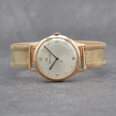 Jaeger-LeCoultre Herrenarmbanduhr in RoseG 585/000, Werk Schweiz um 1950, Handaufzug, neutr. RoseG 585/000 Geh. & Band später, silb. Zifferbl. m. ...