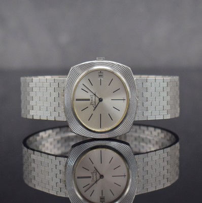 PIAGET Armbanduhr in WG 750/000 Ref. 13448, Schweiz um 1970, Automatik, massives Geh., Boden 4-fach verschr., WG 750/000 Gliederband, silb. ...