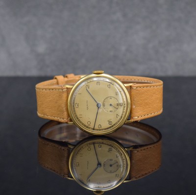 ZENITH Herrenarmbanduhr in GG 750/000, Schweiz um 1940, Handaufzug, 3-teil. Gehäuse, Boden & Glasrand aufgedr., gold. Zifferbl. m. arab. Zahlen, ...