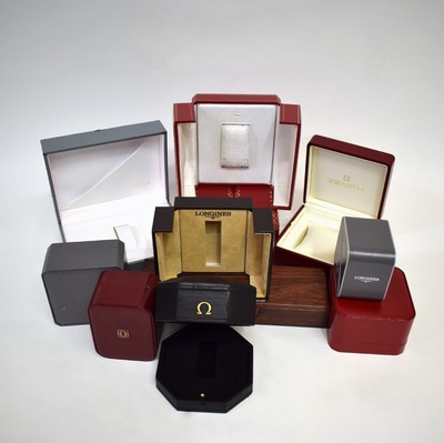 Konvolut: 11 Uhren-Etuis, davon 4x Omega, 2x Longines, 3x Zenith, 2x Cartier, Schweiz um 1990, 5 mit Umkartons, 2 Halterungen fehlend, teils besch., ...