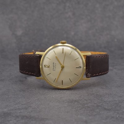 GLASHÜTTE Herrenarmbanduhr, Deutschland um 1960, Handaufzug, verg. Gehäuse, Stahlboden aufgedr., silb. Zifferbl. m. aufges. Std.- Ind., gold. ...