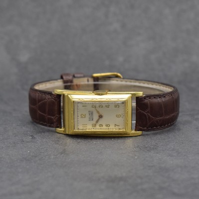 BRUNER Masterbilt vergoldete, pultförmige asymetrische Armbanduhr, Schweiz/USA um 1960, Boden aufgedr., silb. Zifferbl. m. arab. Std., Anz. v. Std. ...