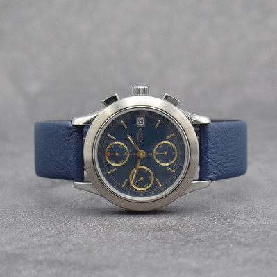 GUINAND nahezu neuwertige Herrenarmbanduhr mit Chronograph, Schweiz um 2000, Automatik, verschr. Geh. in Edelstahl, blaues Zifferbl. m. aufges. gold. ...