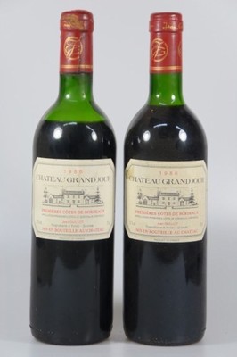 11 Fl. 1986 Chateau Grand Jour, 1eres Cotes de Bordeaux, Jean Guillot, 75cl, mid shoulder bis top shoulder, Alters- und Gebr.-spuren, nicht ...