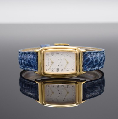 TIFFANY & Co. Armbanduhr mit 2 Zeitzonen in GG 750/000 Referenz M 203, Schweiz um 2000, quarz, zur Zeigerstellung ausklappbares Innengeh., Boden ...