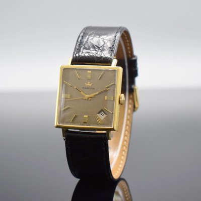 MARVIN Herrenarmbanduhr in GG 750/000, Schweiz um 1965, Handaufzug, 2-teil. Geh., Boden aufgedr., gold. Zifferbl. m. aufges. Std.-Ind., gold. Zeiger, ...