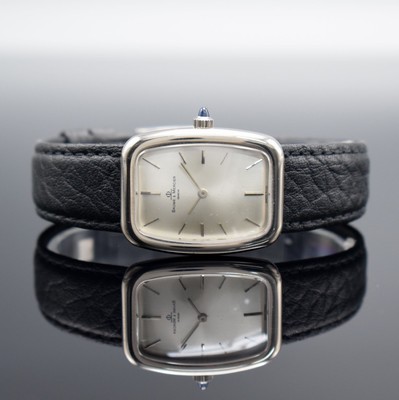 BAUME & MERCIER Damenarmbanduhr in WG 750/000, Schweiz um 1980, Handaufzug, 2-teil. Geh., Boden 4-fach verschr., neutr. Lederband m. orig. Dornschl. ...