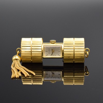 BUCHERER vergoldete Anhängeuhr, Schweiz um 1970, Handaufzug, durch bewegl. Schalen verschließbar, silb. Zifferbl. m. aufges. Std.-Ind., schwarze ...