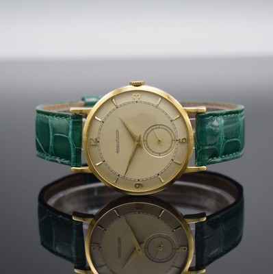 Jaeger-LeCoultre elegante Herrenarmbanduhr in GG 750/000, Schweiz um 1950, Handaufzug, 2- tlg. Geh., Boden aufgedr., silb. Duoton Zifferbl. pat., ...