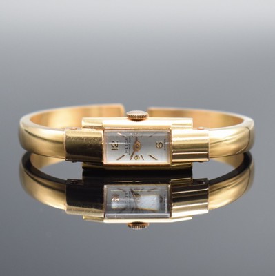 FLICA Damenspangenuhr in RoséG 750/000, Schweiz um 1940, Handaufzug, Boden aufgedr., silb. Zifferbl. m. gold. Ind. & arab. Zahlen, gold. Zeiger, ...