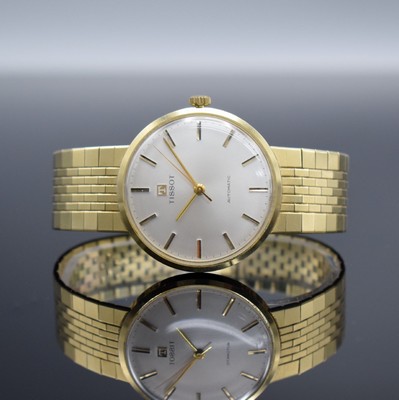 TISSOT Herrenarmbanduhr in GG 585/000, Schweiz um 1965, Automatik, 2-teil. Geh., Boden aufgedr., orig. GG 585/000 Band, silb. Zifferbl. m. aufges. ...
