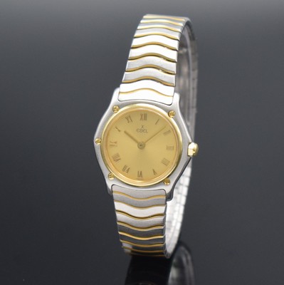 EBEL Damenarmbanduhr in Edelstahl & Gold, Schweiz um 1990, quarz, Geh. m. 5-fach verschr. Goldlünette, Gliederband m. Faltschl., gold. Zifferbl. m. ...