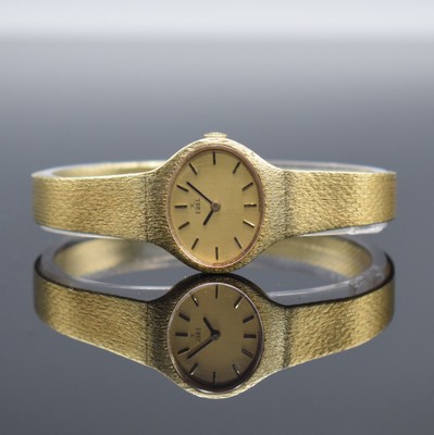 EBEL Damengoldbanduhr in GG 585/000, Schweiz um 1970, Handaufzug, Boden aufgedr., Geh. an Goldband in GG 585/000, gold. Zifferbl. m. aufges. ...