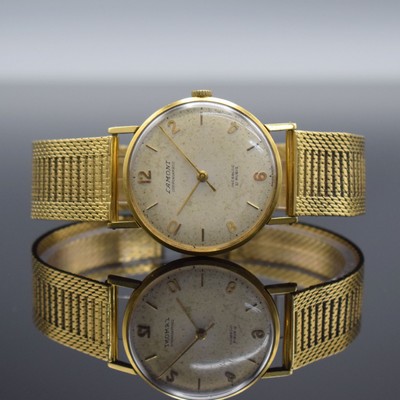 LAMONT Compensamatic Herrenarmbanduhr in GG 750/000, Schweiz um 1960, Handaufzug, Boden aufgedr., GG 750/000 Band, silb. Zifferbl. altersb. fl./pat., ...