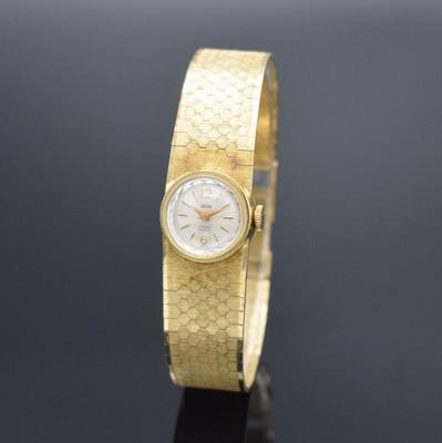 ROX Damenarmbanduhr in GG 585/000, Schweiz um 1965, Handaufzug, Geh. an Goldband in GG 585/000, Boden aufgedr., silb. Zifferbl. m. gold. Std.-Ind. & ...