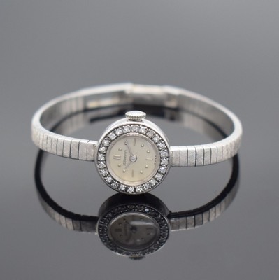 ESZEHA Damenarmbanduhr in WG 750/000 & 585/000, Deutschland/Schweiz um 1940, Handaufzug, 2-teil. Geh. in WG 585/000, Boden aufgedr., Lünette m. ...