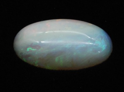 Loser Opal-Cabochon, ca. 10.11 ct, länglichoval, Farbspiel in Gelb und Blau