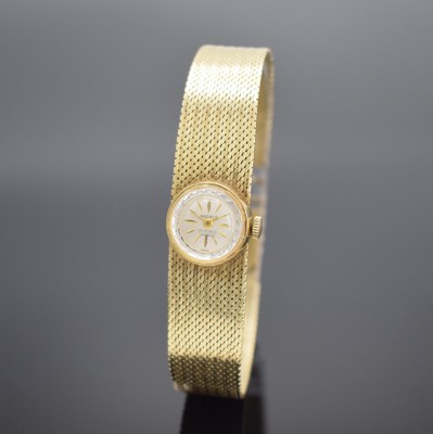 MERIT Damenarmbanduhr in GG 585/000, Schweiz 1960er Jahre, Handaufzug, Boden aufgedr., an Goldband GG 585/000 Armband, silb. Zifferbl. m. gold. ...