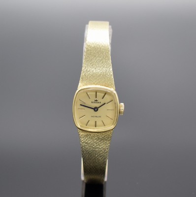 AMARA Damenarmbanduhr in GG 585/000, Schweiz um 1970, Handaufzug, GG 585/000 Armband, Boden aufgedr., goldfarb. Zifferbl. m. aufges. Std.-Ind., ...