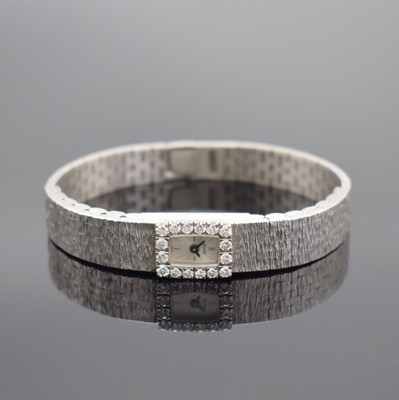 PIAGET Damenarmbanduhr in WG 750/000 mit Diamantbesatz, Schweiz um 1960, Handaufzug, Ref. 1308 A6, inkl. Goldband in WG 750/000, Lünette aufw. m. ...
