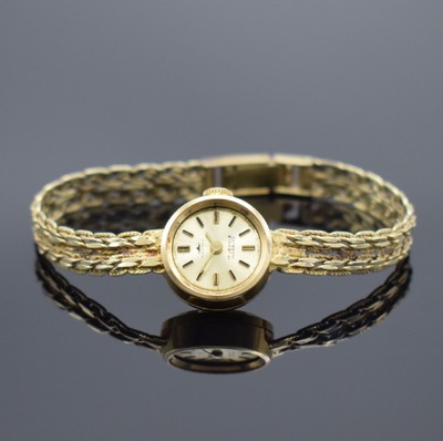 KRÖNER Damengoldbanduhr in GG 585/000, Schweiz 1960er Jahre, Handaufzug, Geh. an Goldband in GG 585/000, Boden aufgedr., goldfarb. Zifferbl. m. ...