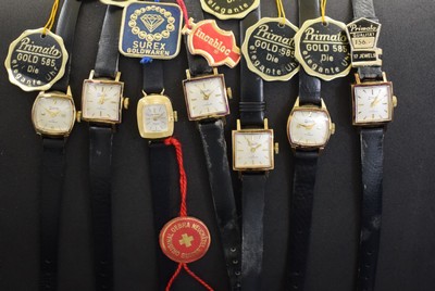 6 Primato & 1 Oebra Damenarmbanduhren in GG 585/000 aus Lagerbestand, Schweiz um 1950- 1960, alle Handaufzug, Geh. teils angel., Böden gedr., silb. ...