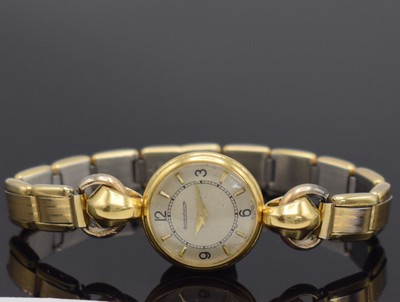 Jaeger-LeCoultre Damenarmbanduhr in GG 750/000, Schweiz um 1940, Handaufzug sog. Backwinder, 2-teil. Geh., Boden 2-fach verschr., neutr. verg. Band ...