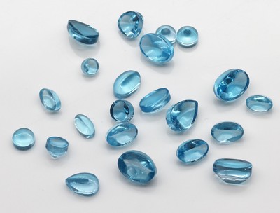 Lot lose Blautopas-Cabochons (beh.) zus. ca. 902 ct, Idar Obersteiner Schleifarbeit