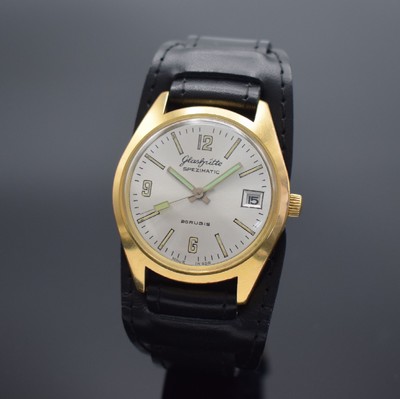 GLASHÜTTE Spezimatic vergoldete Armbanduhr, DDR um 1975, Automatik, 2-tlg. Geh., gedr. Stahlboden, silb. Zifferbl., Leuchtindizes & -zeiger ...