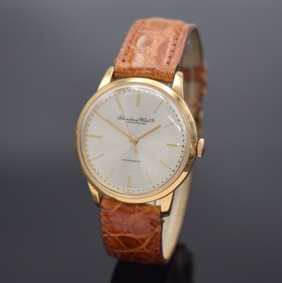 IWC Herrenarmbanduhr in RoseG 750/000, Schweiz um 1962, Automatik, 3-tlg. Geh., Boden & Glasrand aufgedr., silb. Zifferbl. rest., rotgold. Zeiger, ...