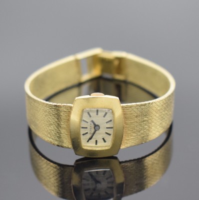 DUGENA Damenarmbanduhr in GG 585/000, Deutschland um 1970, Handaufzug, 2-teil. Geh., Boden aufgedr., Milanaiseband in GG 585/000, silb. Zifferbl. m. ...