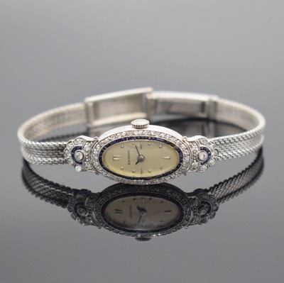 ESZEHA Art Deco Damenuhr in Platin an neutralem WG 585/000 Band, Handaufzug, Schweiz um 1940, Scharniergeh. aufw. m. Diamanten & Saphiren bes. (z. T. ...