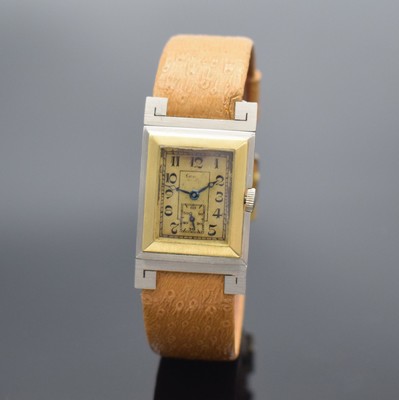 GLYCINE Armbanduhr in GG/WG 750/000, Handaufzug, Schweiz um 1935, ausgef. Scharniergeh. m. bewegl. Bandanst., gold. Duoton-Zifferbl. altersbed. fl., ...