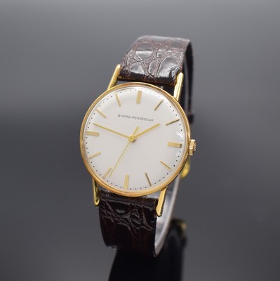 GIRARD PERREGAUX Herrenarmbanduhr in GG 750/000, Schweiz um 1965, Handaufzug, Boden aufgedr., silb. Zifferbl. m. gold. Std.-Ind. & Zeigern rest., ...
