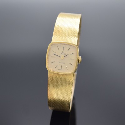 OMEGA De Ville Damenarmbanduhr in GG 750/000, Handaufzug, Schweiz um 1972, 2- teil. Gehäuse, Boden aufgedr., orig. Milanaiseband, gold. ...