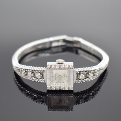 ANKER Damenarmbanduhr in WG 585/000 mit Diamanten, Schweiz um 1965, Handaufzug, Boden aufgedr., silb. Zifferbl. m. silb. Std. Ind. & Zeigern, Kal. AS ...