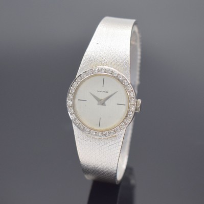 MARS Damenarmbanduhr in WG 585/000, Schweiz um 1965, Handaufzug, Boden gedr., Lünette mit Diamanten bes., silb. Zifferbl., silb. Dauphinezeiger, ...