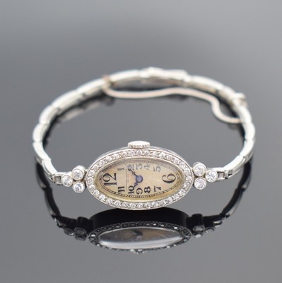 AUDEMARS PIQUET & Co Art Deco Damenarmbanduhr mit Diamanten, Schweiz um 1925, Handaufzug, Geh. & Band in WG 750/000, Lünette & Anstöße aufw. m. ...