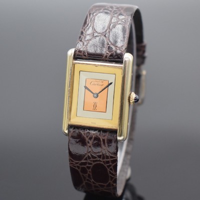 CARTIER Damenarmbanduhr Modellserie Tank, Handaufzug, Schweiz um 1980, verg. Sterlingsilbergeh. ber., Zifferblatt Tricolor (RG/GG/WG), Mineralglas ...