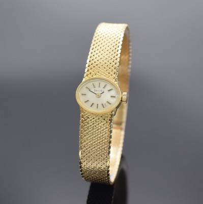 ZENTRA Damenarmbanduhr in GG 585/000, Handaufzug, Schweiz um 1965, Boden aufgedr., silb. Zifferbl. m. aufgel. Indizes altersbed. fl., Anz. v. Std. & ...