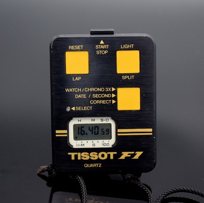 TISSOT F1 seltene Stoppuhr mit Uhrzeit & Kalender, Schweiz um 1980, quarz, schwarz beschichtetes Metallgehäuse, Boden 4-fach verschr., Stoppfkt., ...