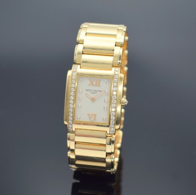 PATEK PHILIPPE Damenarmbanduhr Serie Twenty-4 in Roségold 750/000 Referenz 4910/11R, Gliederband m. dopp. Faltschl., Geh. aufw. m. Brillanten bes., ...