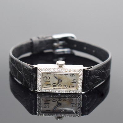 Art Deco Damenarmbanduhr in WG 750/000 mit IWC Werk & Diamanten, Schweiz um 1925, Handaufzug, neutr. Geh. sign. D & L. Co, Gehäuserand & ...