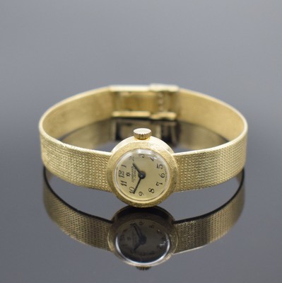 JUNGHANS Damenarmbanduhr in GG 585/000, Handaufzug, Deutschland um 1965, 2-teil. Geh., Boden aufgedr., Milanaiseband, gold. Zifferbl. m. arab. Std., ...