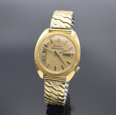 BULOVA Herrenarmbanduhr Accuquartz in GG 585/000 mit Kaliber 2242, Schweiz um 1972, Boden verschr., z. T. matt. Gold-Zifferbl., aufges. ...