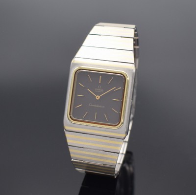 OMEGA Constellation elegante Herrenarmbanduhr in Stahl/Gold, Schweiz um 1980, quarz, Ref. 395.0800, Geh. m. integriertem orig. Band & Faltschl., ...