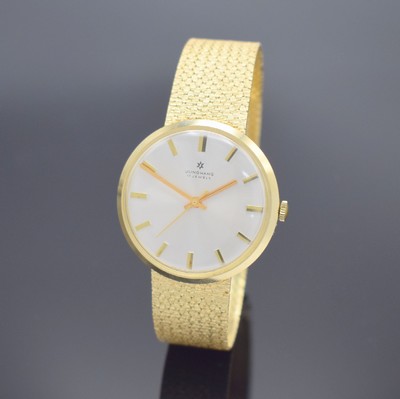 JUNGHANS Herrenarmbanduhr in GG 585/000, Deutschland verk. lt. beil. Garantie 05/1974, Handaufzug, Boden aufgedr., silb. Zifferbl. m. aufges. ...