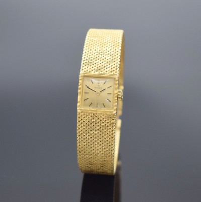 MILUS Damenarmbanduhr in GG 750/000, Schweiz um 1960, Handaufzug, Milanaiseband, Boden aufgedr., champagnerfarb. Zifferbl. m. aufgel. Std.-Ind., ...